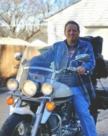 Sean riding motorcycle